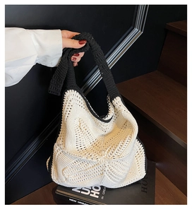 Close-up of contrast woven crochet bag showing 3D geometric star pattern texture