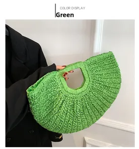 Detail of green woven handbag with curved handle and inner lining for summer fashion