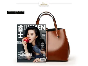 Size comparison of brown leather tote bag showing spacious interior fitting A4 magazines