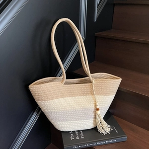 Three-tone gradient straw tote bag with tassel charm for beach and daily commute use
