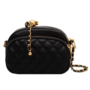 Fashionable black quilted leather crossbody bag with gold chain and lucky ball charm