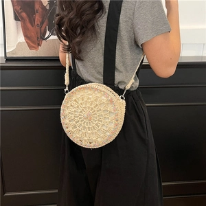 Borsa a tracolla rotonda in paglia stile boho con ricami floreali e tracolla sottile