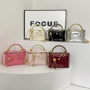 Glossy patent leather mini chain bags in six colors with gold handles and floral charms