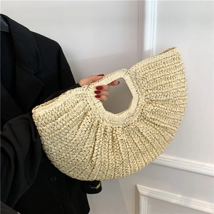 French vintage beige woven straw handbag with unique semi-circle design and round handle