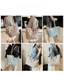 Detail of woven tote bags with lace bows and pearl chains in various colors