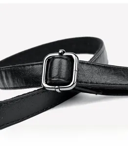 Detail of premium black lychee leather strap with adjustable silver roller buckle