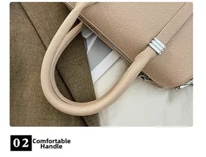 Detail of comfortable handle with premium lychee grain leather and silver hardware