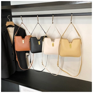 Detailed display of premium leather bucket bags in brown, black, cream and khaki colors