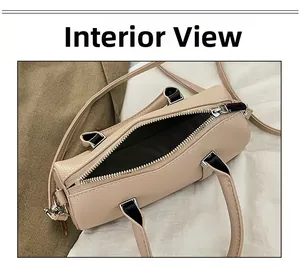 Interior view of beige litchi leather bag showing black lining and phone storage space