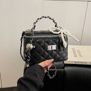 Black quilted rhombic chain bag with pearl bow charm and silver hardware detail