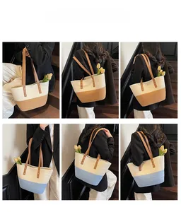 Detail of woven tote bag with knotted texture in bicolor white and camel or blue