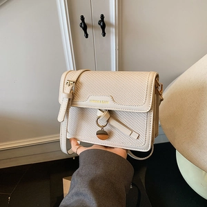 French style cream woven shoulder bag with gold hardware and FASHION & BAGS logo