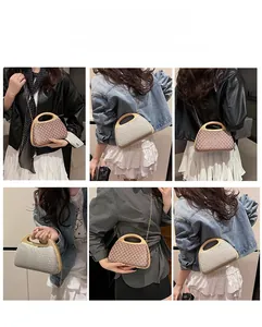 Detailed views of woven crossbody bag with wooden handles and delicate metal chain straps