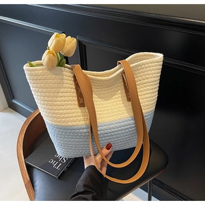 Large woven cotton tote bag in beige and blue stripes for summer beach vacations