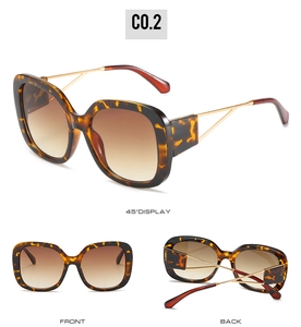 Detailed views of oversized tortoiseshell sunglasses with gold geometric metal temples