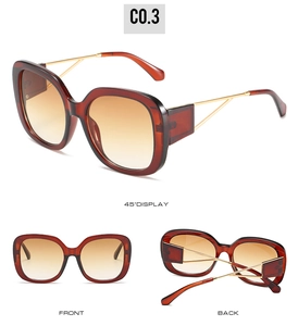 Detail view of square tortoiseshell sunglasses with gold hollow metal temples and gradient lens