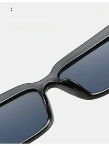 Detail shot of integrated nose pads on black square sunglasses for comfort fit