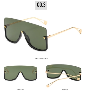 Three-angle view of oversized sunglasses with green lens and gold star metal accents