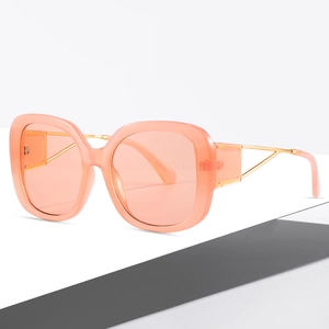 Oversized peach square sunglasses with gold metal decorative temple detail