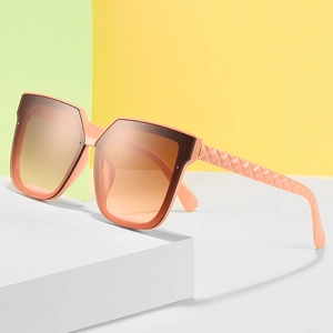 Square peach sunglasses with gradient lenses and textured quilted pattern arms