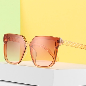 Square frame oversized sunglasses with amber gradient lenses and textured temples