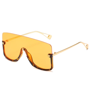 Oversized shield sunglasses with star accents and gradient orange lenses for women