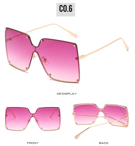 Detailed views of pink gradient oversized sunglasses with gold metal temples