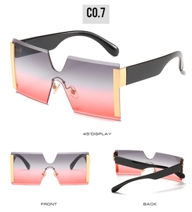 Detailed three-way view of rimless gradient sunglasses with black and gold temples