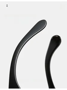 Close-up of curved black mirror legs designed for an arc comfortable wear experience
