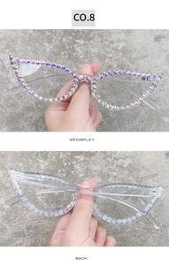 Detail view of cat eye sunglasses featuring hand-set colorful AB rhinestones on the frames