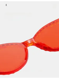 Detail view of comfortable integrated nose pads on red cat eye rhinestone sunglasses