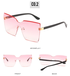 Détails de lunettes de soleil sans monture à dégradé rose avec charnières dorées élégantes