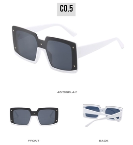 Vues multi-angles de lunettes de soleil carrées en contraste noir et blanc avec rivets
