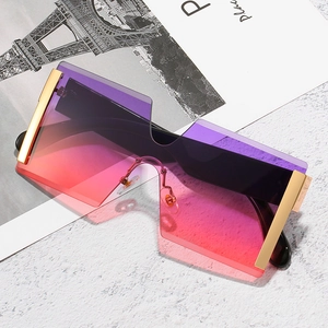 Oversized rimless sunglasses with gradient lenses and gold metal frames for women