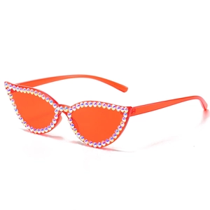 Red cat eye sunglasses with rainbow rhinestones and vibrant red lenses in 45-degree view