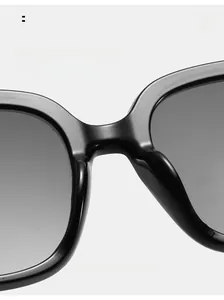 Detailed close-up of ergonomic integrated nose pads on black square frame sunglasses