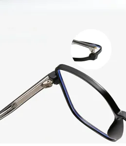 Detail view of durable metal hinge and temple structure on square black glasses frame