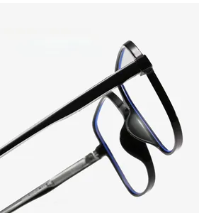 Detail shot of flexible black TR90 square frame glasses with blue light blocking lenses