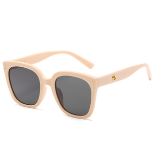 Retro square oversized sunglasses in nude beige with dark grey UV lenses and metal decor