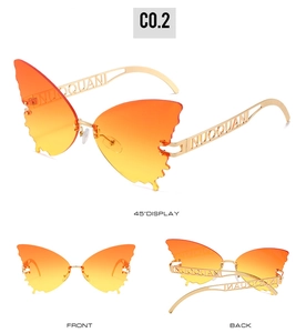 Detailed views of rimless butterfly sunglasses with orange gradient lenses and gold metal arms