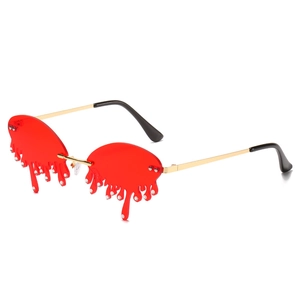 Retro melting heart teardrop sunglasses with golden frame and red dripping lenses