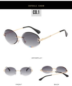 Three-angle views of rimless oval sunglasses with grey gradient lenses and gold metal frames