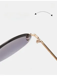 Detail view of durable metal hinges and purple gradient lenses on rimless sunglasses