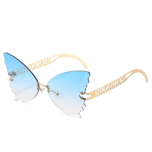 Chic rimless butterfly-shaped sunglasses with blue gradient lenses and gold metal frames