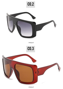 Front view of trendy oversized sunglasses in classic black and tortoise gradient frames
