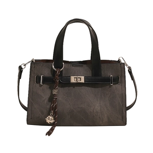 2025 minimalist dark grey tote bag with contrast black handles and silver swivel lock