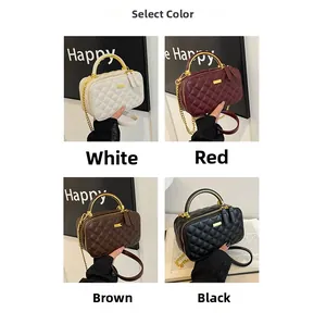 Detail view of four diamond quilted bags in white, red, brown and black with gold handles