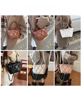 Quilted tote bag detail showcasing multiple colors and versatile carrying styles
