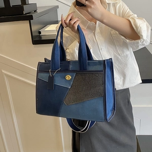 Fashionable color-block denim tote bag with gold lock and detachable shoulder strap