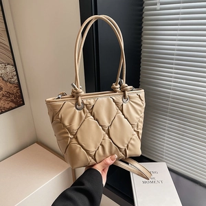 Quilted beige tote bag with knots and adjustable shoulder strap for women